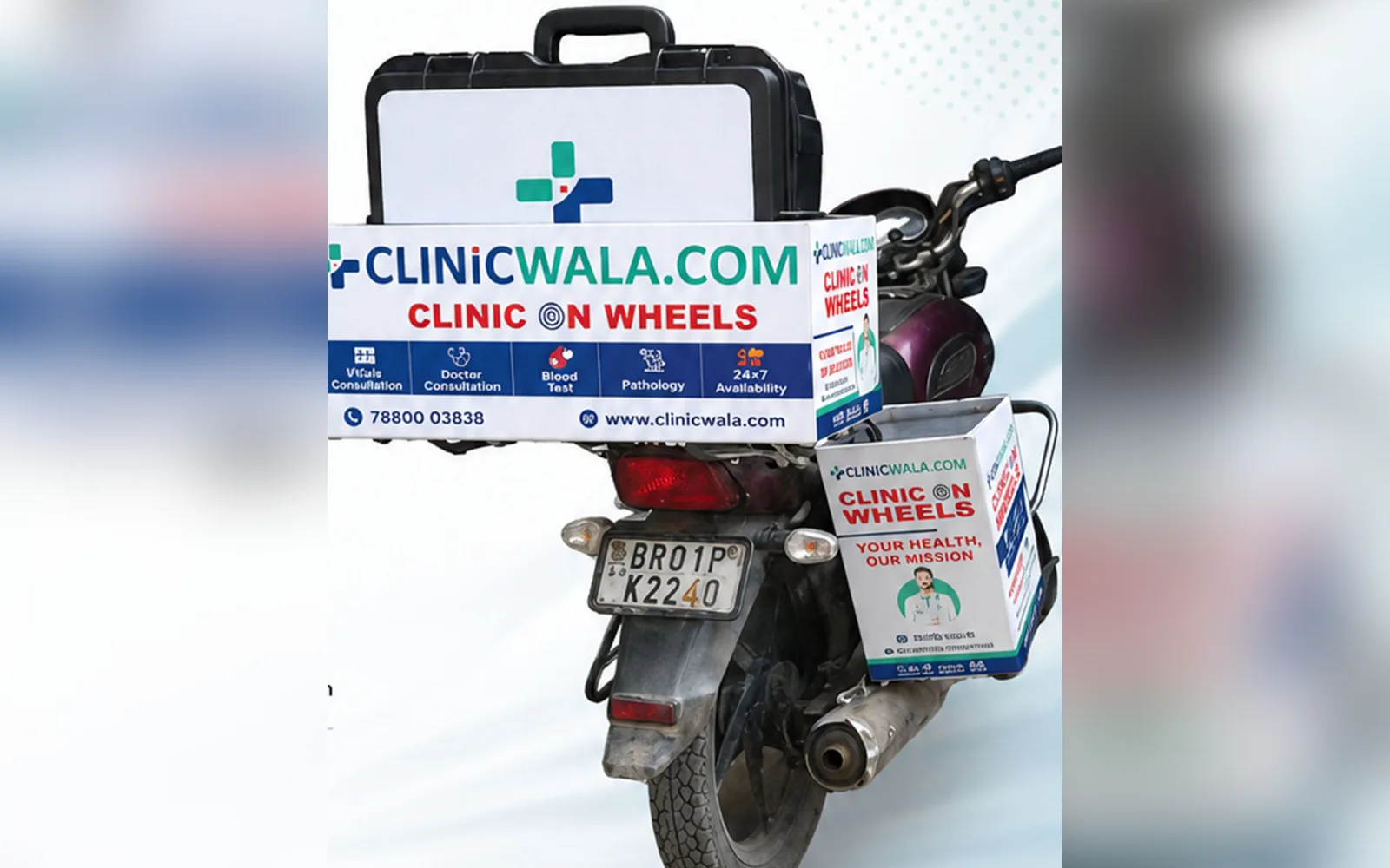 The ClinicWala Clinic on Wheels bike unit — a Bihar-registered motorcycle fitted with the branded diagnostic case and service boxes listing vitals, doctor consultation, blood tests, pathology and 24×7 availability